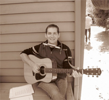 Stephen King Playing Acoustic Guitar